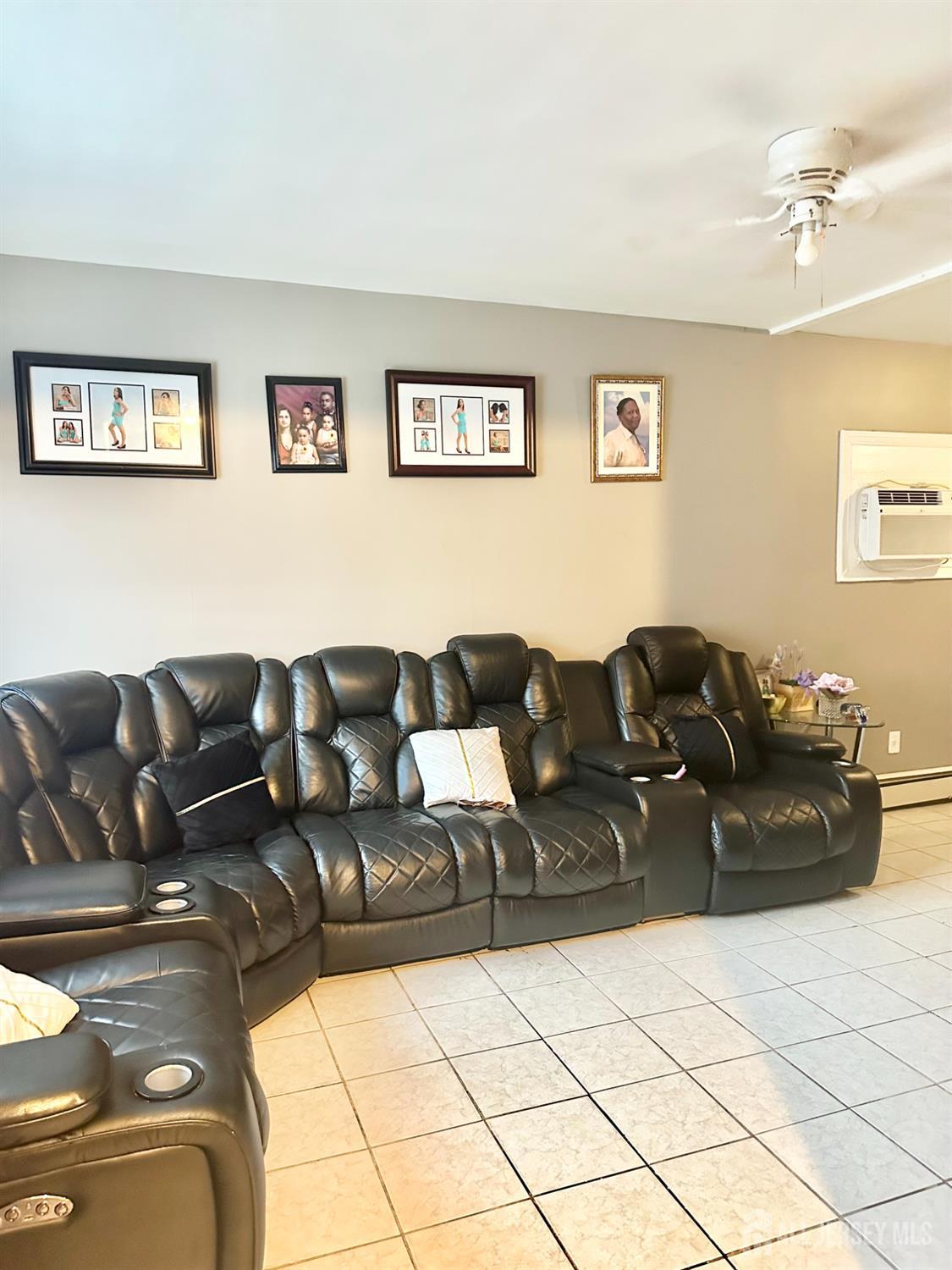 44 South Ward Street New Brunswick, NJ 08901 - Photo 17 of 34 a living room with couches and a coffee table