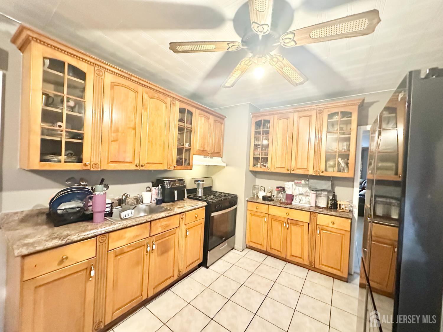 44 South Ward Street New Brunswick, NJ 08901 - Photo 22 of 34 a kitchen with stainless steel appliances a stove sink and cabinets