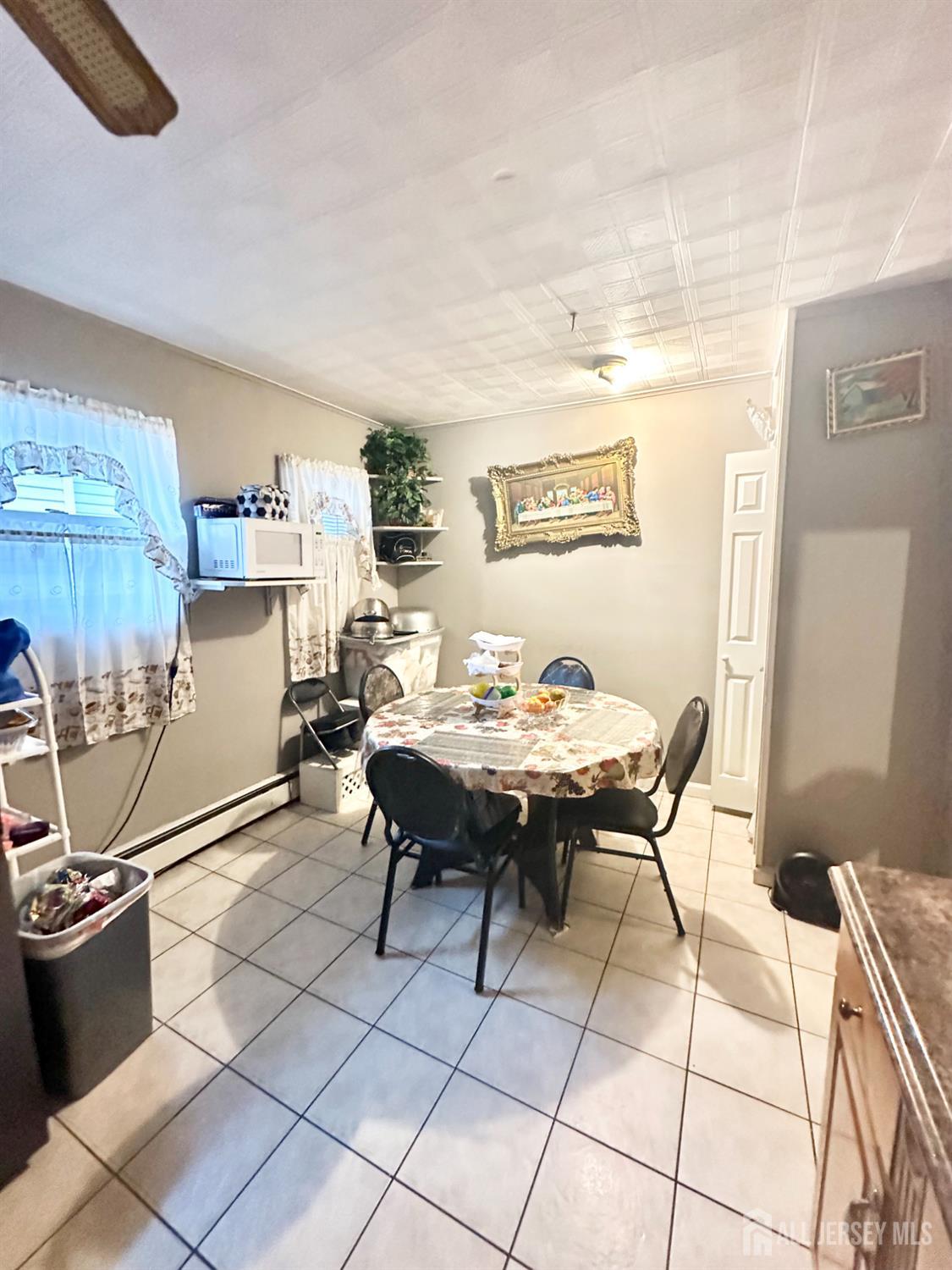 44 South Ward Street New Brunswick, NJ 08901 - Photo 26 of 34 a view of a dining room with a table and chairs