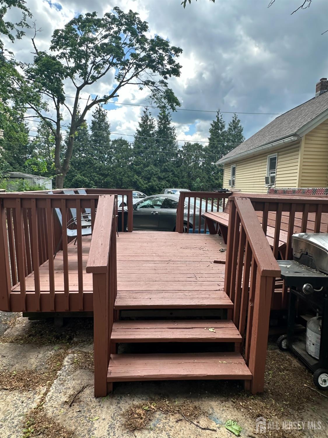 44 South Ward Street New Brunswick, NJ 08901 - Photo 6 of 34 a view of a wooden deck with furniture