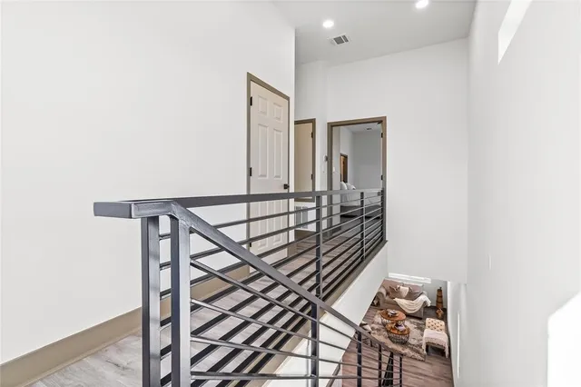 a living room with a couch and a window