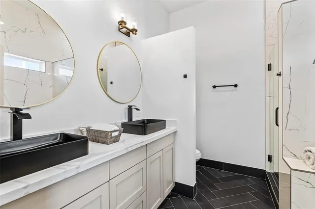 a close view of a sink and a cabinet in a kitchen