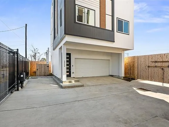 a kitchen with a sink a stove and refrigerator