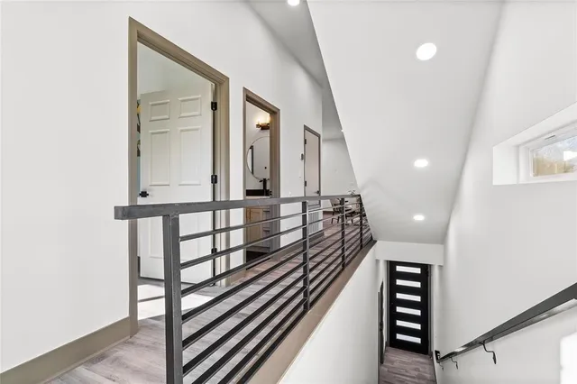 a view of a hallway view with staircase