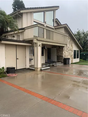 front view of a house with a street