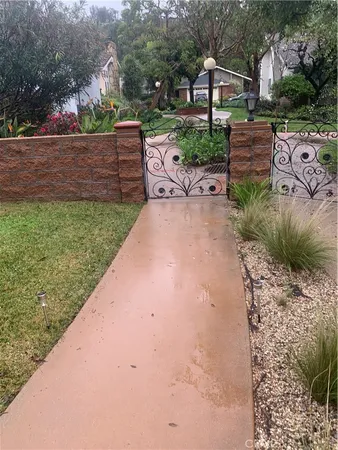 a view of a backyard with sitting area