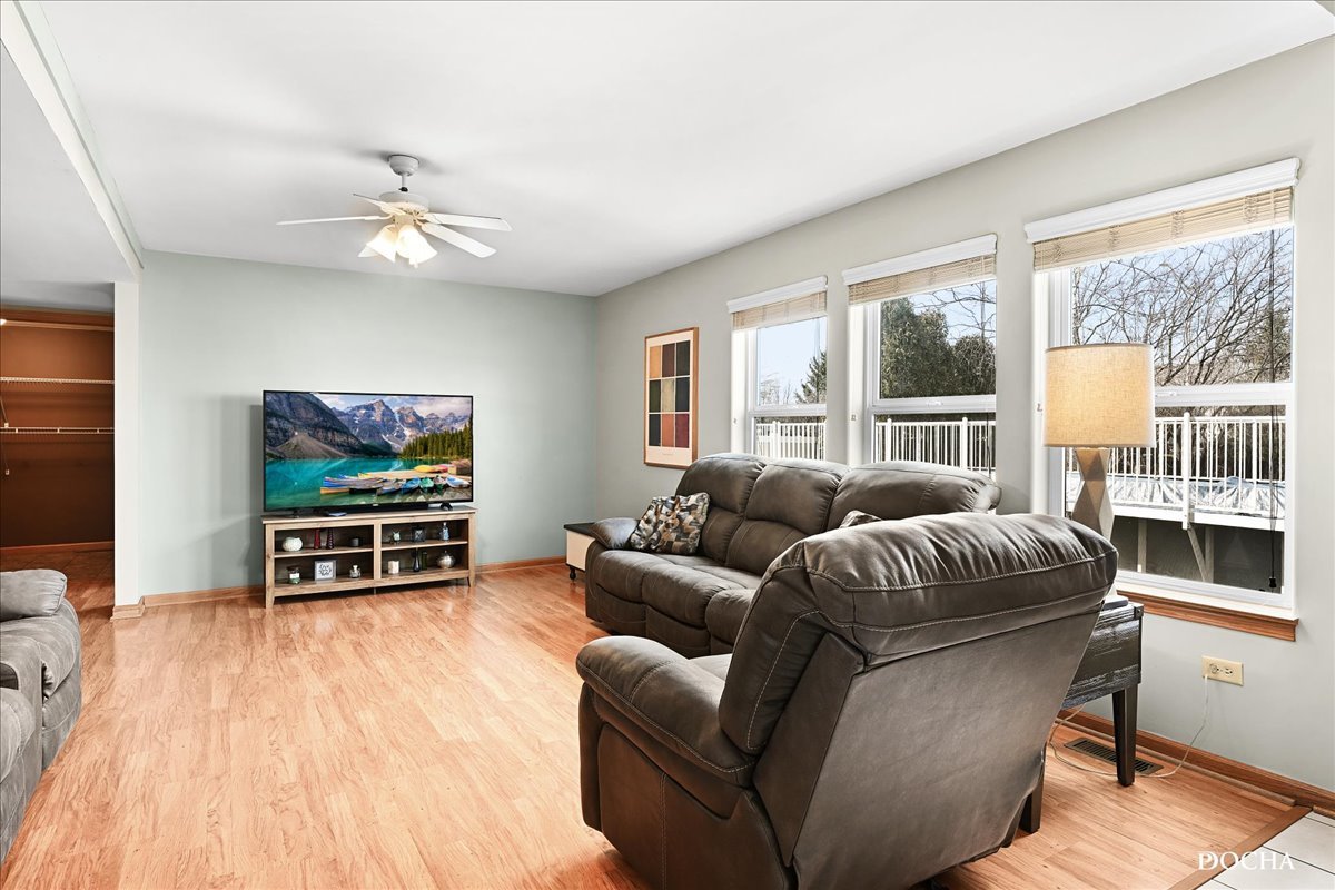 2209 Gray Hawk Drive Plainfield, IL 60586 - Photo 11 of 51 a living room with furniture and a flat screen tv