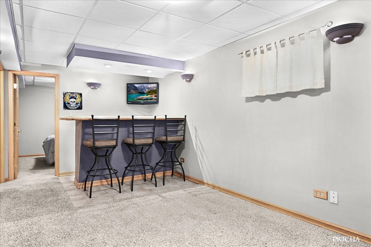 2209 Gray Hawk Drive Plainfield, IL 60586 - Photo 28 of 51 a view of a livingroom with furniture and window