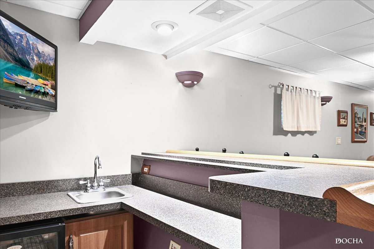 2209 Gray Hawk Drive Plainfield, IL 60586 - Photo 30 of 51 a bathroom with a sink and a mirror