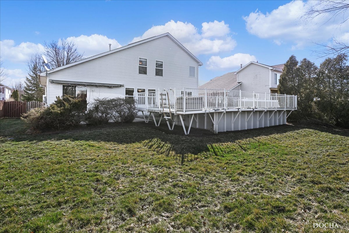 2209 Gray Hawk Drive Plainfield, IL 60586 - Photo 37 of 51 a view of a house with wooden deck
