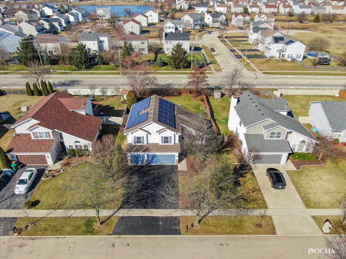 2209 Gray Hawk Drive Plainfield, IL 60586 - Photo 43 of 51 an aerial view of a house with a swimming pool