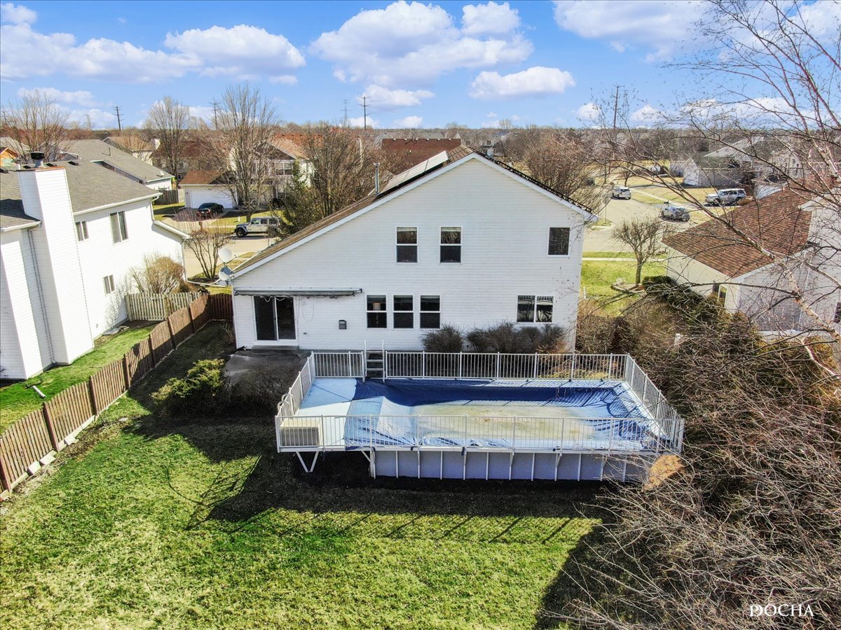 2209 Gray Hawk Drive Plainfield, IL 60586 - Photo 50 of 51 a view of a house with backyard and sitting area