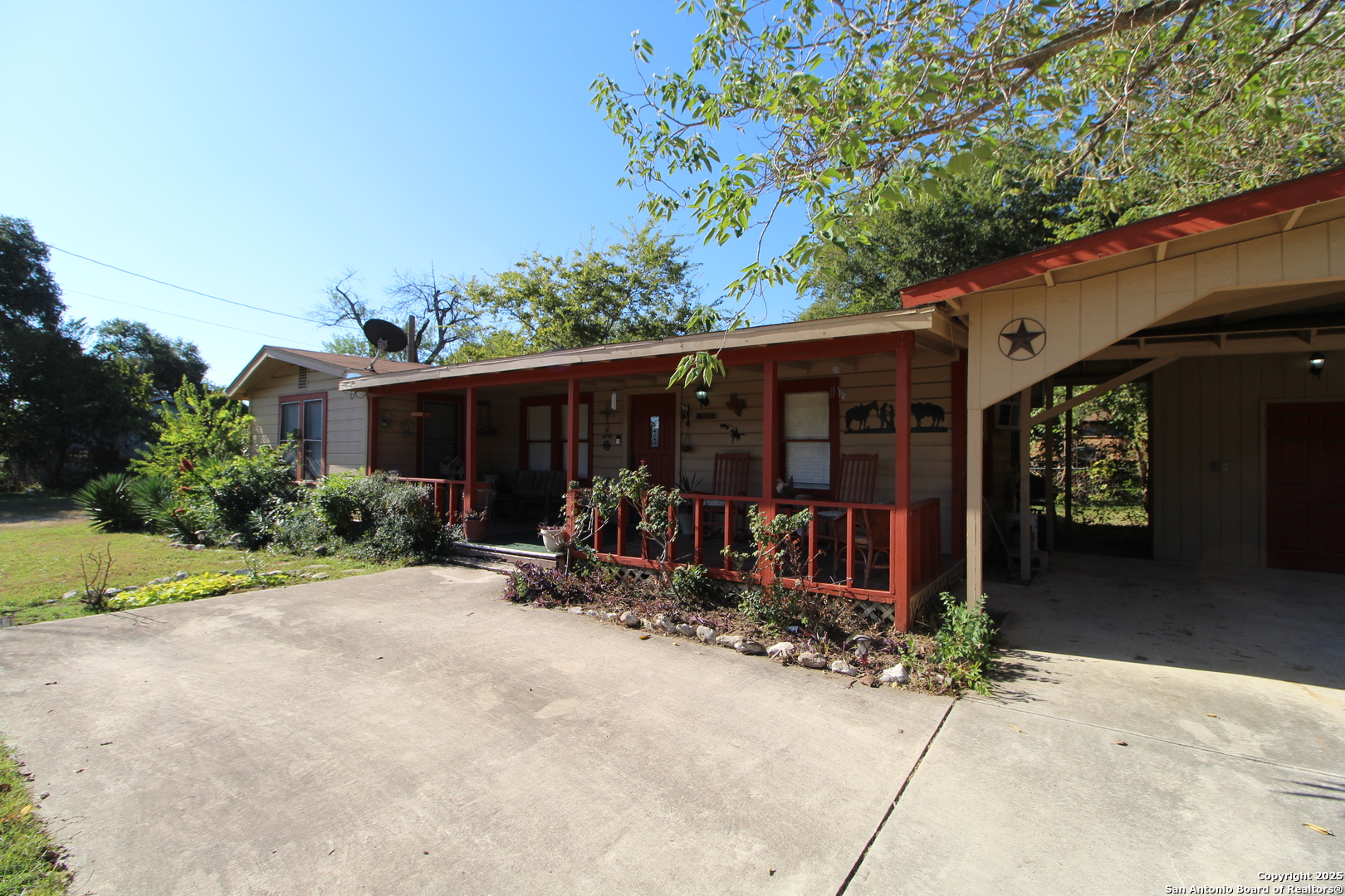19411 South Somerset Street Lytle, TX 78052 - Photo 3 of 27 a view of house with outdoor seating area