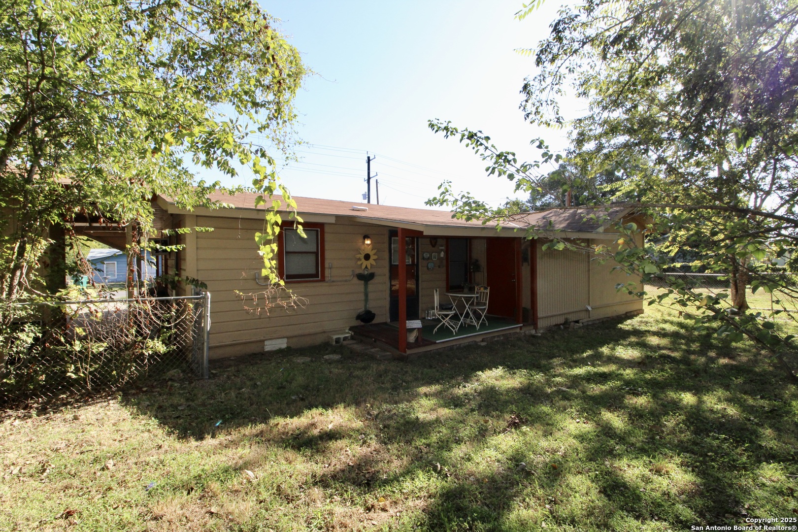 19411 South Somerset Street Lytle, TX 78052 - Photo 6 of 27 a view of a house with a yard