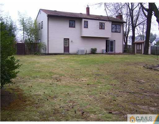 29 Morganville Road Old Bridge, NJ 07747 - Photo 9 of 9 a front view of house with yard and trees