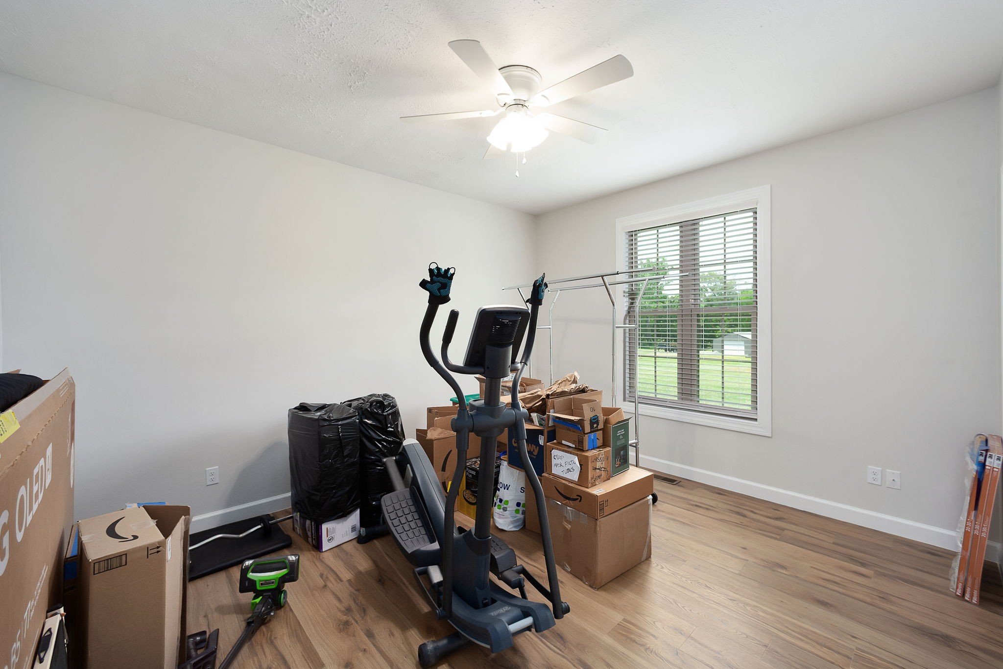 745 Alman Cemetery Road Paris, TN 38242 - Photo 16 of 31 a view of a workspace with furniture and a window