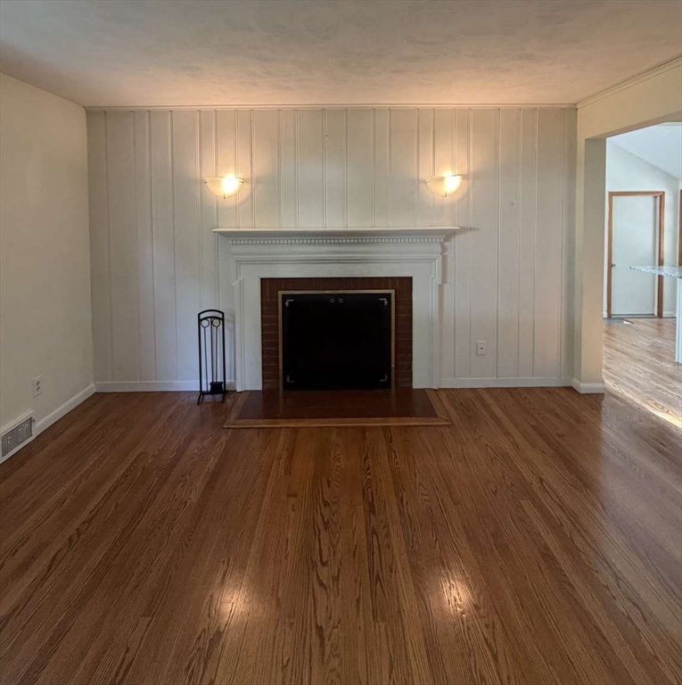 74 Birch Road Longmeadow, MA 01106 - Photo 11 of 38 a view of empty room with wooden floor and fireplace