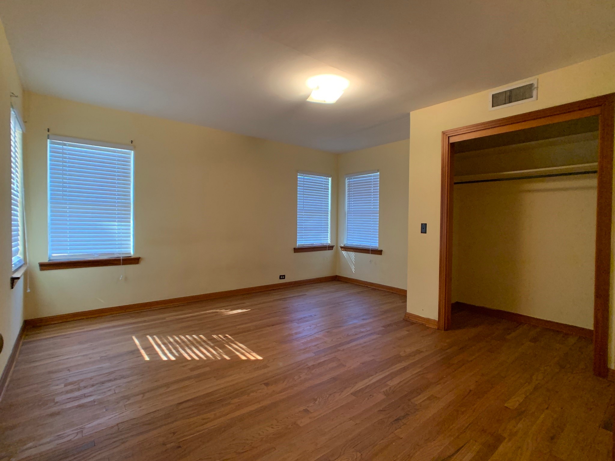 519 West Commerce Street Buffalo, TX 75831 - Photo 21 of 28 a view of empty room with wooden floor and fan