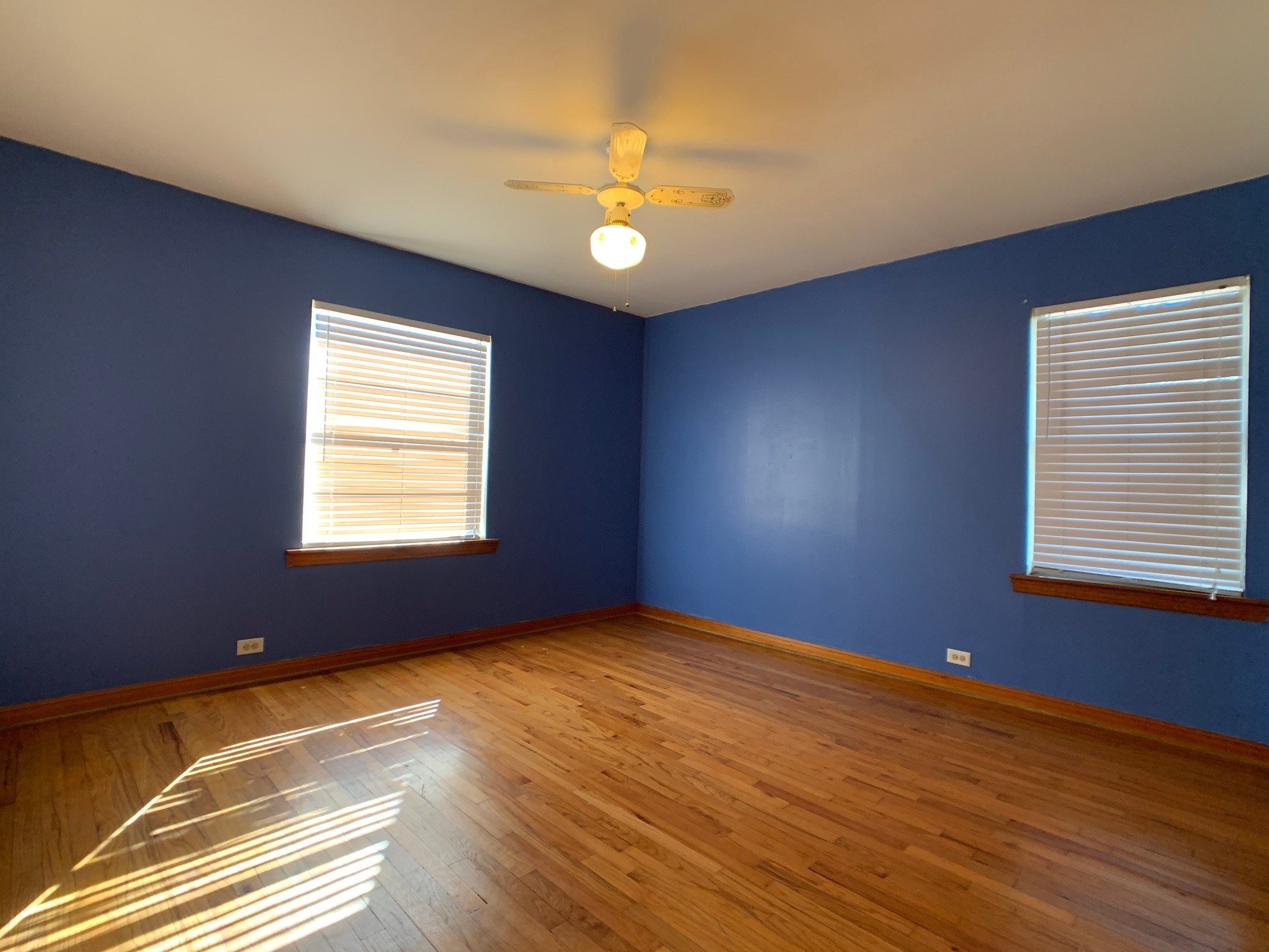 519 West Commerce Street Buffalo, TX 75831 - Photo 23 of 28 a view of an empty room with window and chandelier fan