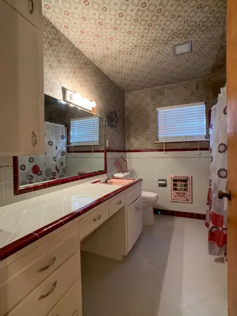 a bathroom with a bath tub