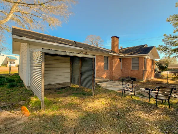 a view of a lake with a house