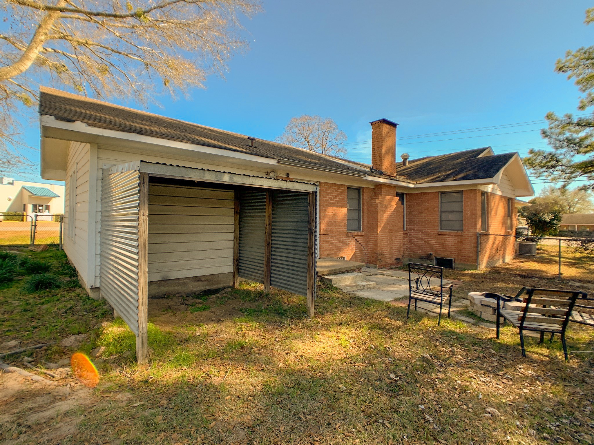 519 West Commerce Street Buffalo, TX 75831 - Photo 8 of 28 a view of house with backyard