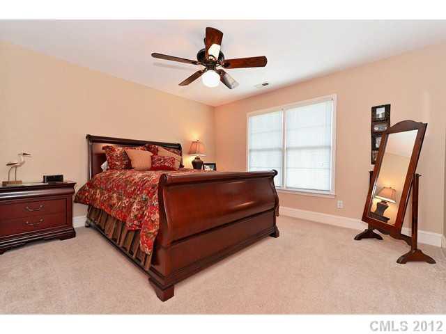 550 Cranborne Chase Fort Mill, SC 29708 - Photo 12 of 16 a bedroom with a bed and a window