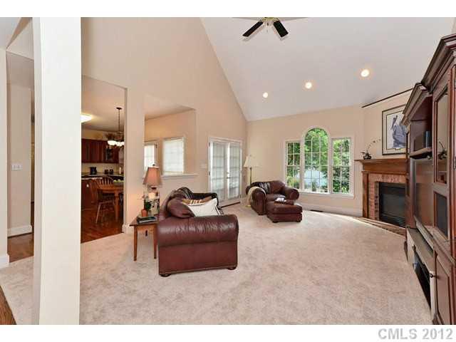 550 Cranborne Chase Fort Mill, SC 29708 - Photo 8 of 16 a living room with furniture and a fireplace