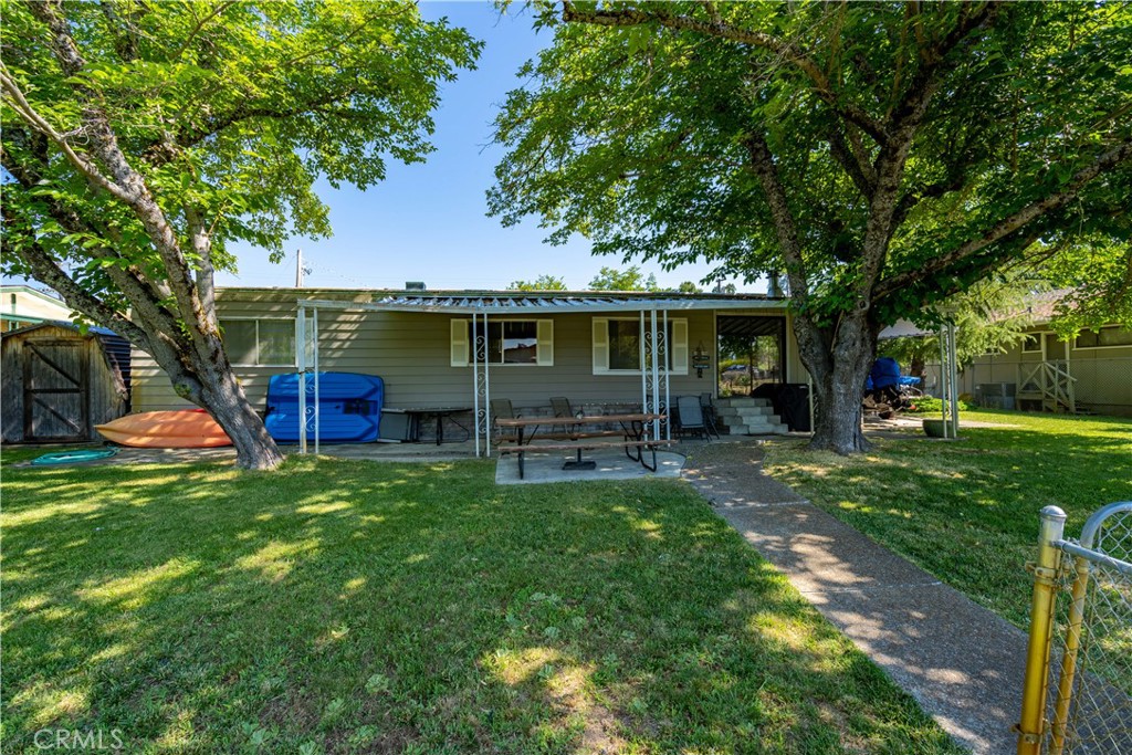 44 Lafferty Road Lakeport, CA 95453 - Photo 1 of 1 a view of a house with a backyard porch and sitting area