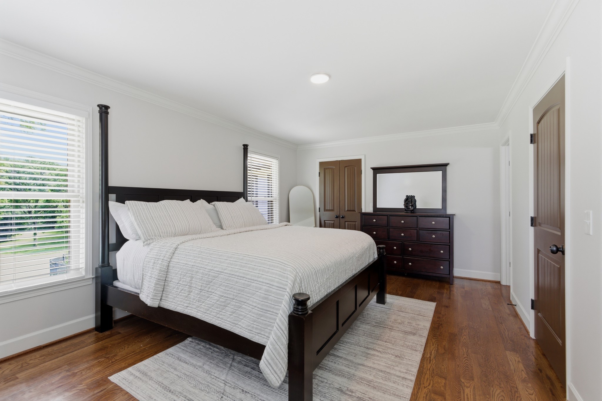 7939 Hooten Hows Road Nashville, TN 37221 - Photo 32 of 66 a bedroom with bed and window