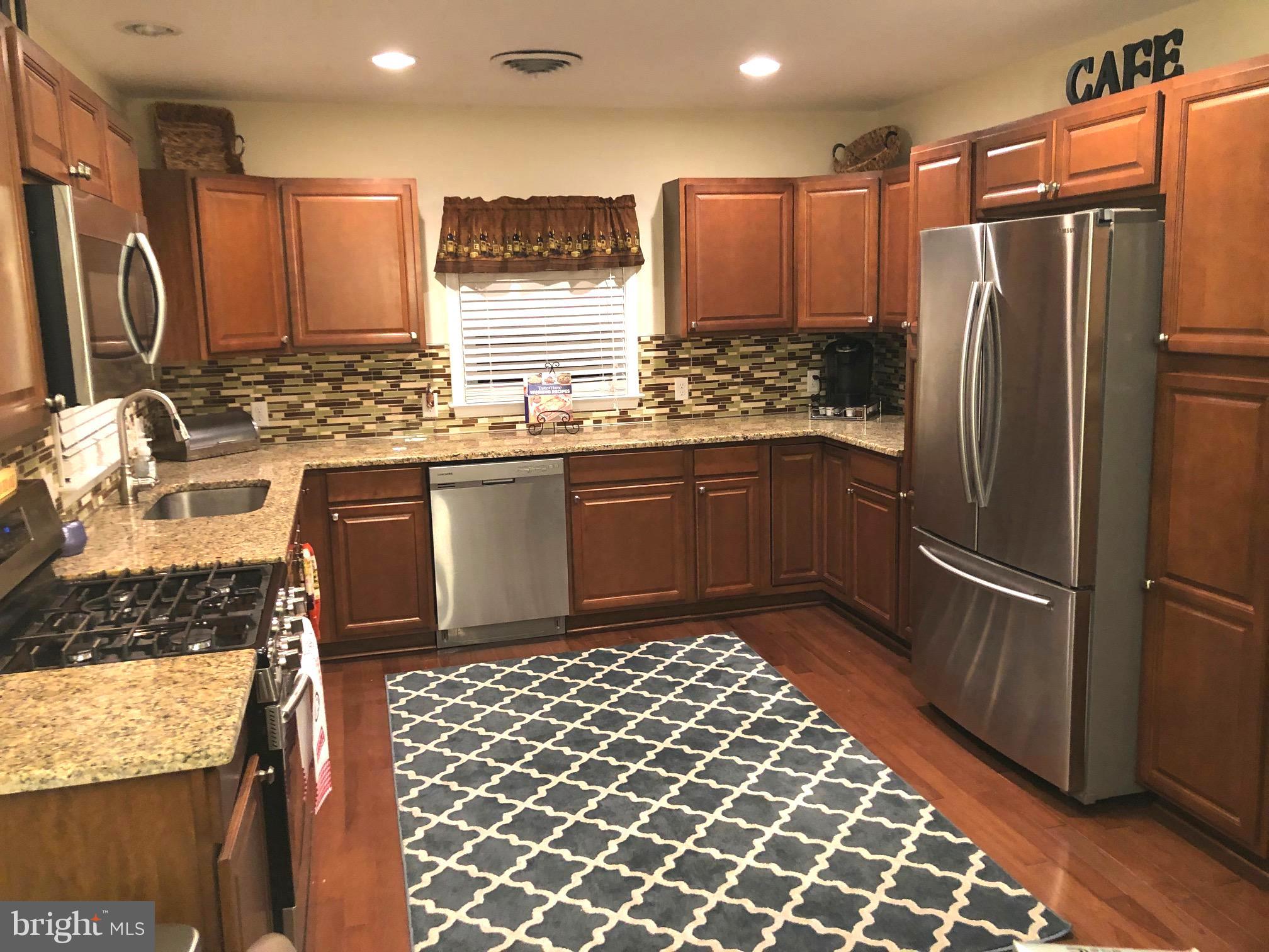 1 Twin Oaks Road Linthicum, MD 21090 - Photo 49 of 84 Gourmet Chef's kitchen w/granite & stainless appl.