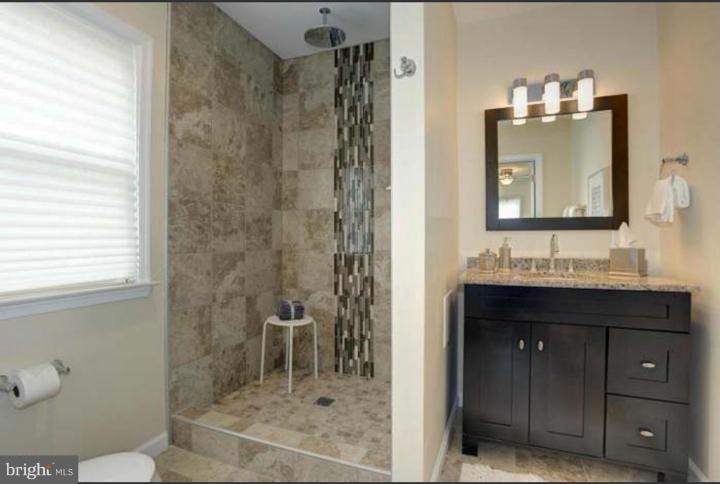 1 Twin Oaks Road Linthicum, MD 21090 - Photo 9 of 84 Relax in this beautiful redone Master bathroom.