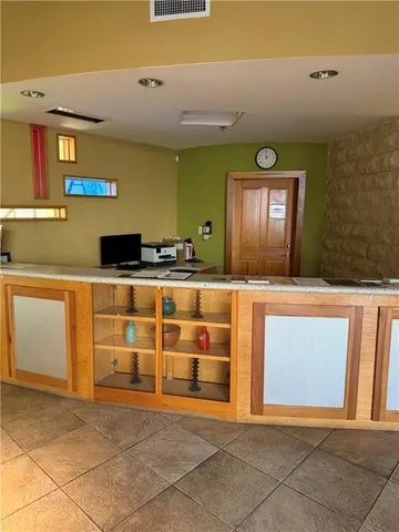 a view of a hallway with entryway