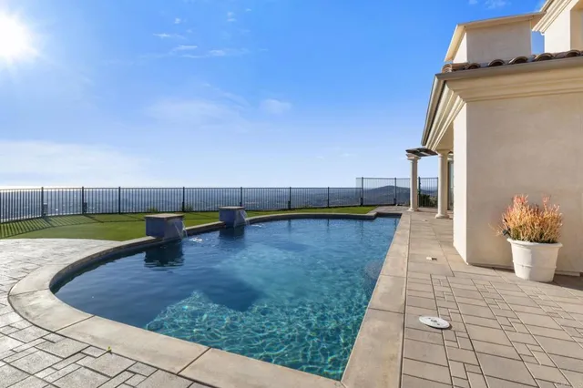 a view of a balcony with an outdoor space