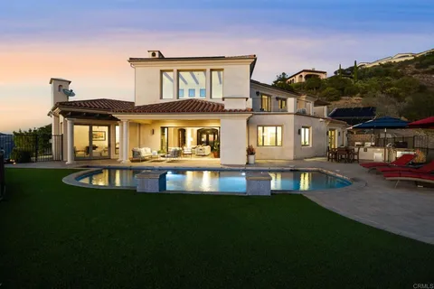 a view of a street with a building in the background