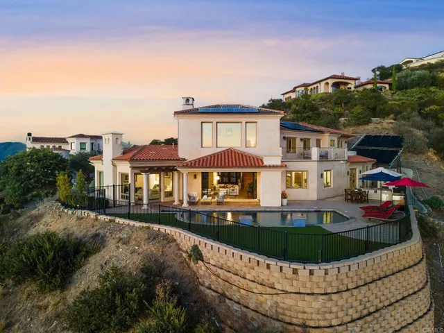 an aerial view of residential house with outdoor space