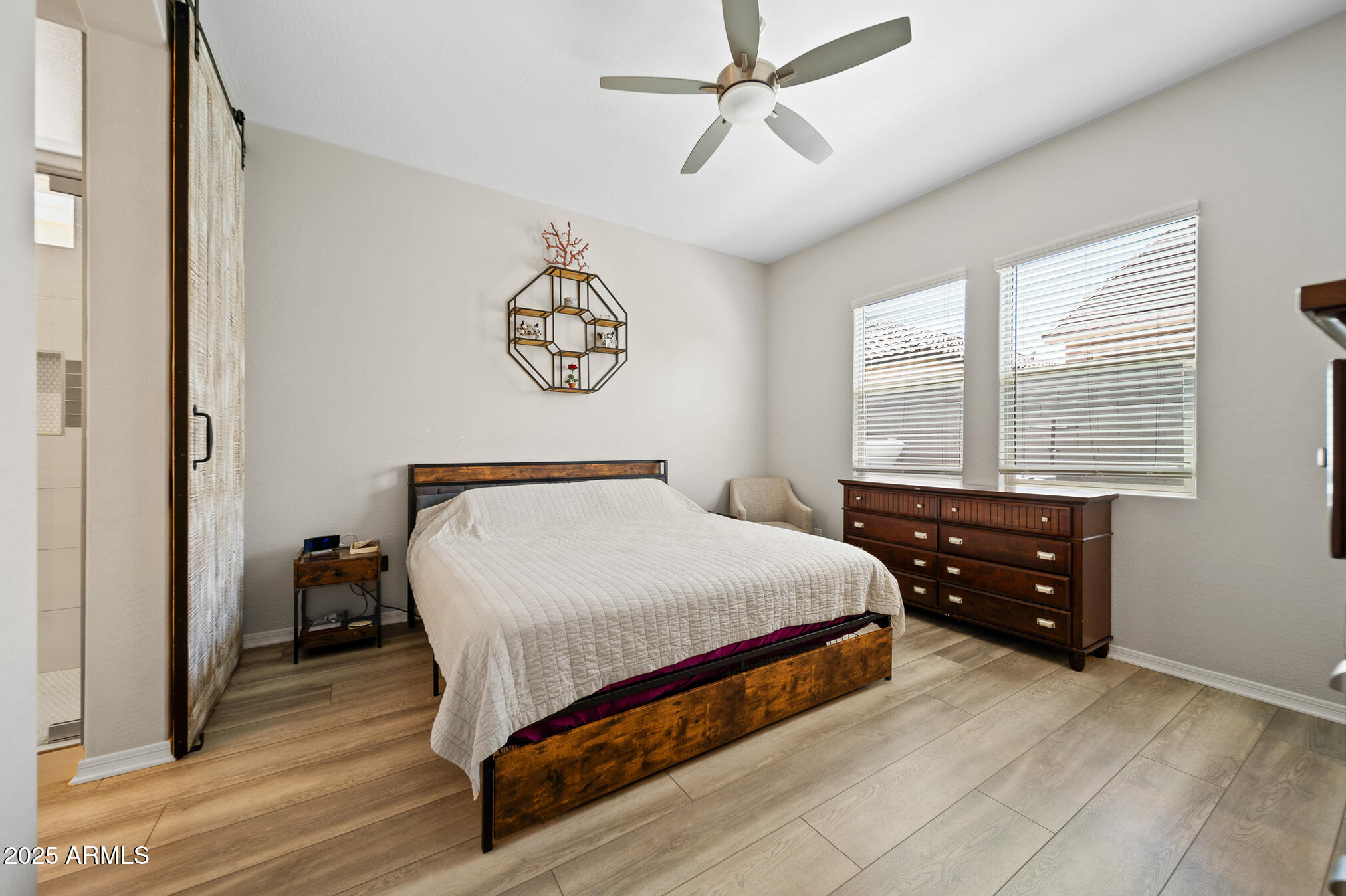4155 East Jesse Street Gilbert, AZ 85295 - Photo 24 of 71 a bedroom with a bed and a window