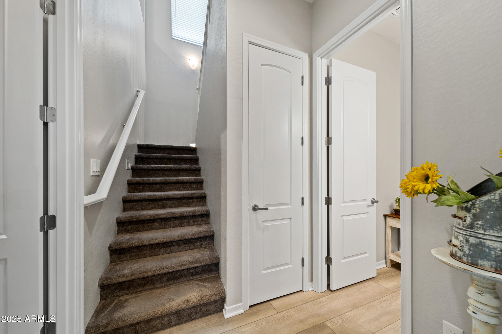 4155 East Jesse Street Gilbert, AZ 85295 - Photo 31 of 71 a view of entryway and hall with wooden floor