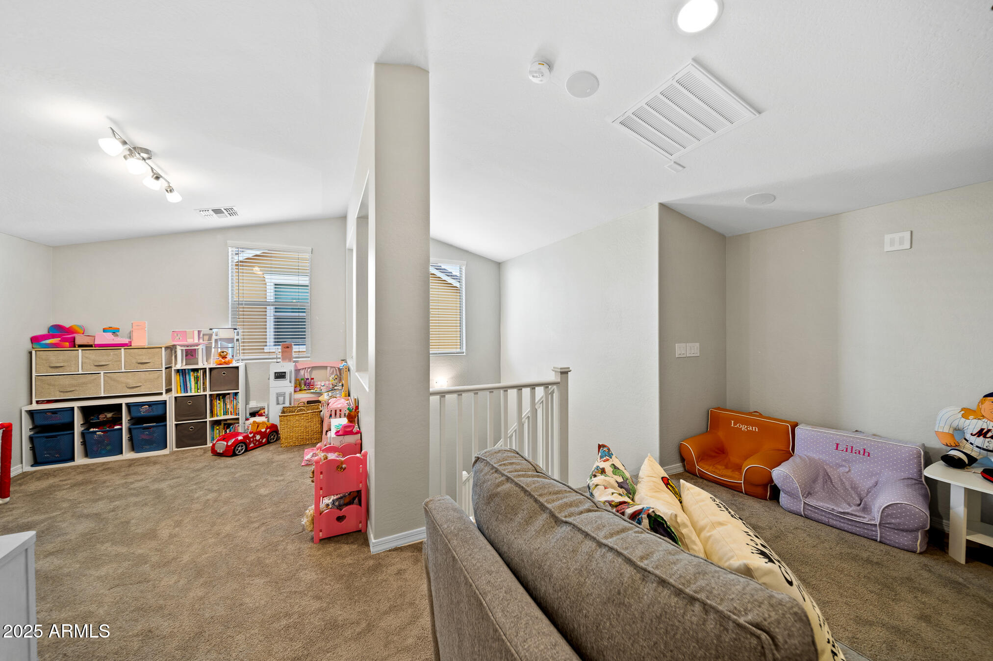 4155 East Jesse Street Gilbert, AZ 85295 - Photo 36 of 71 a bedroom with furniture and a chandelier
