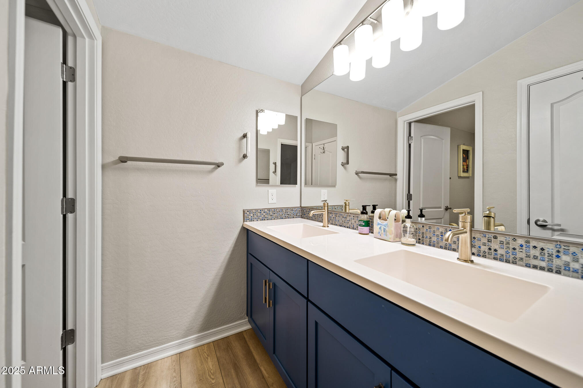 4155 East Jesse Street Gilbert, AZ 85295 - Photo 37 of 71 a bathroom with a double vanity sink mirror and