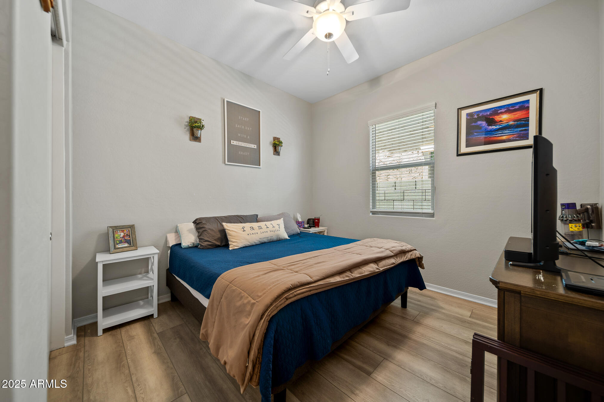 4155 East Jesse Street Gilbert, AZ 85295 - Photo 42 of 71 a bedroom with a bed and a flat screen tv