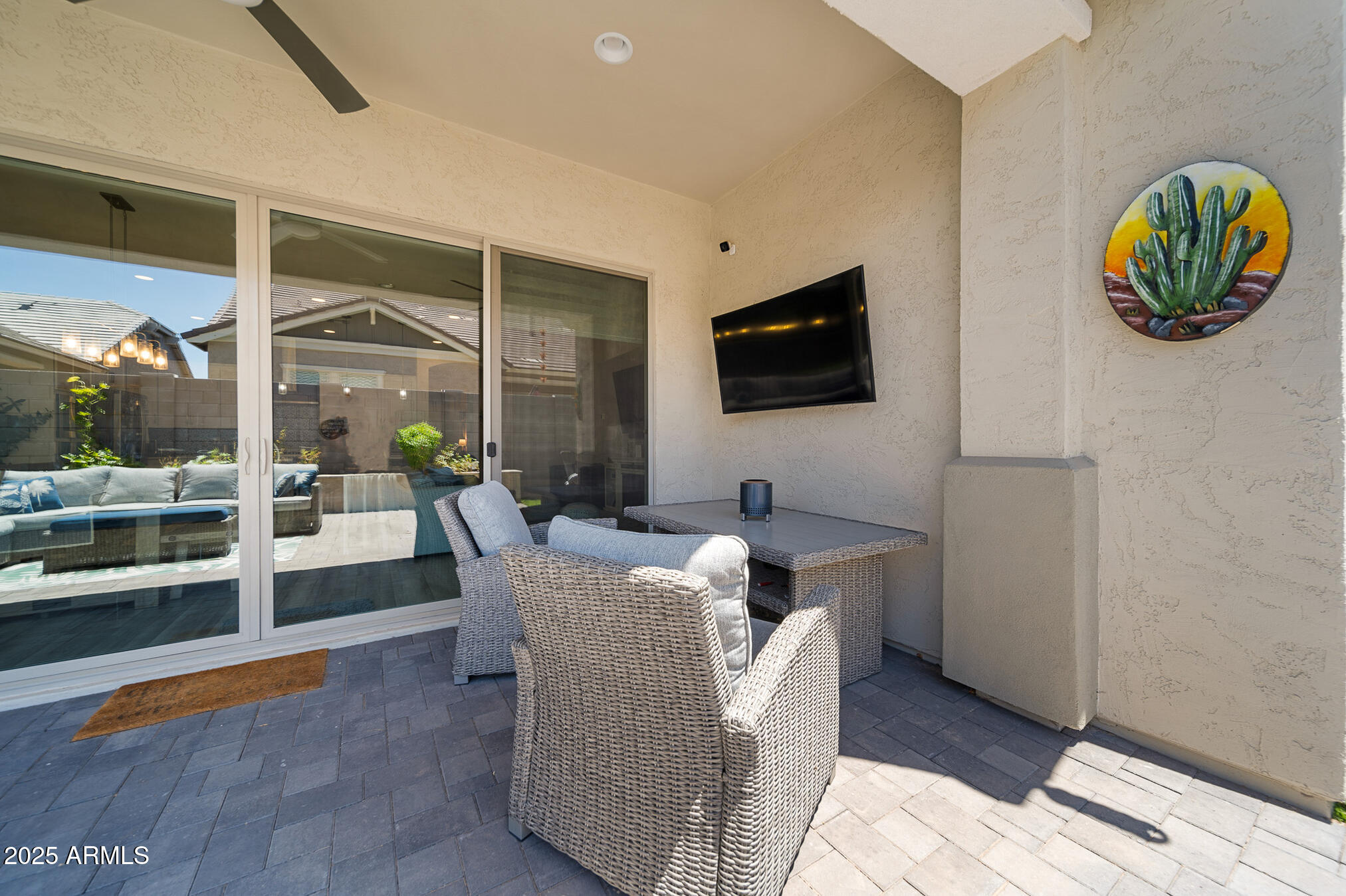 4155 East Jesse Street Gilbert, AZ 85295 - Photo 46 of 71 a living room with furniture and a flat screen tv