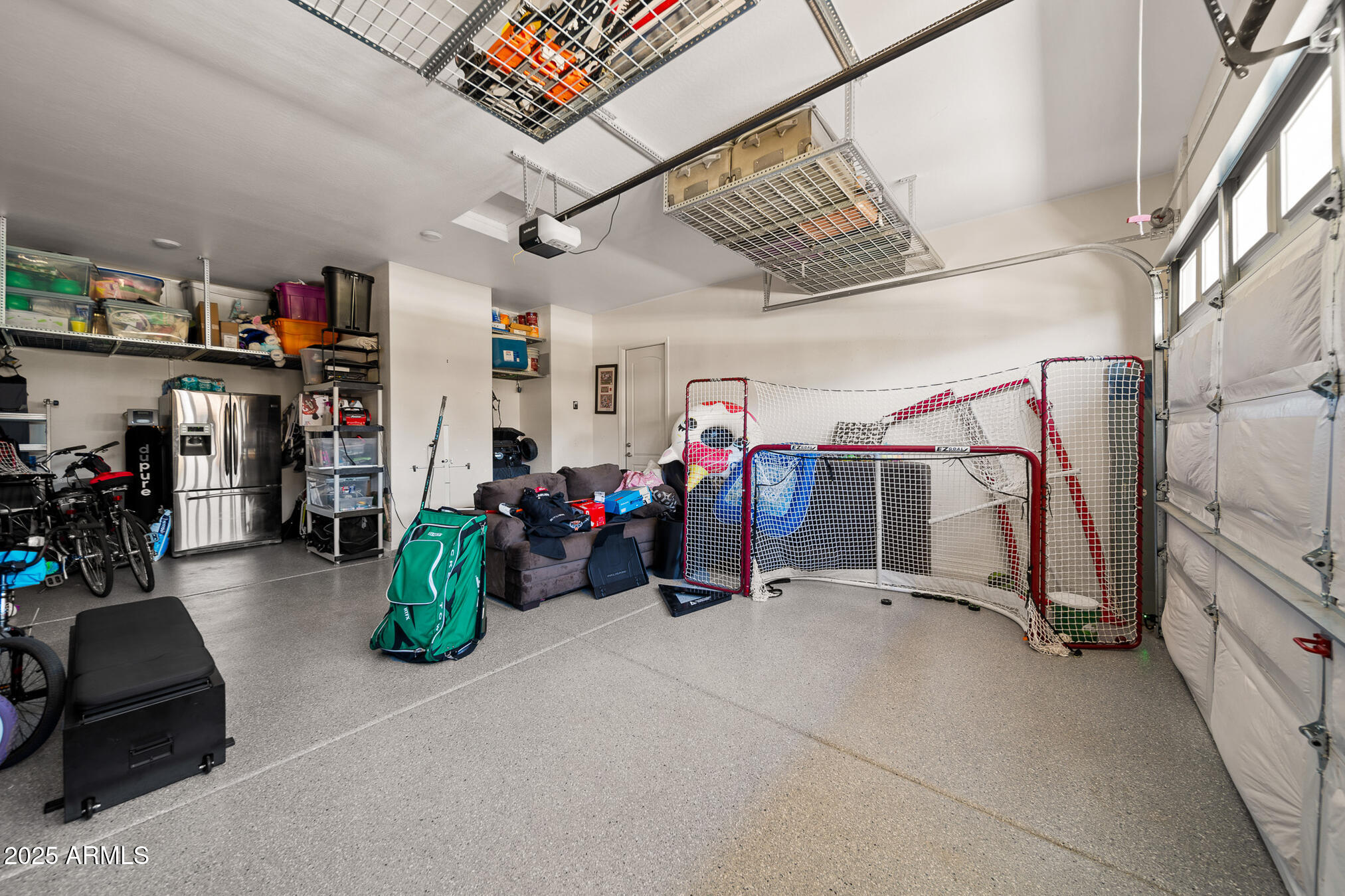 4155 East Jesse Street Gilbert, AZ 85295 - Photo 50 of 71 a view of a garage with rack and bicycle