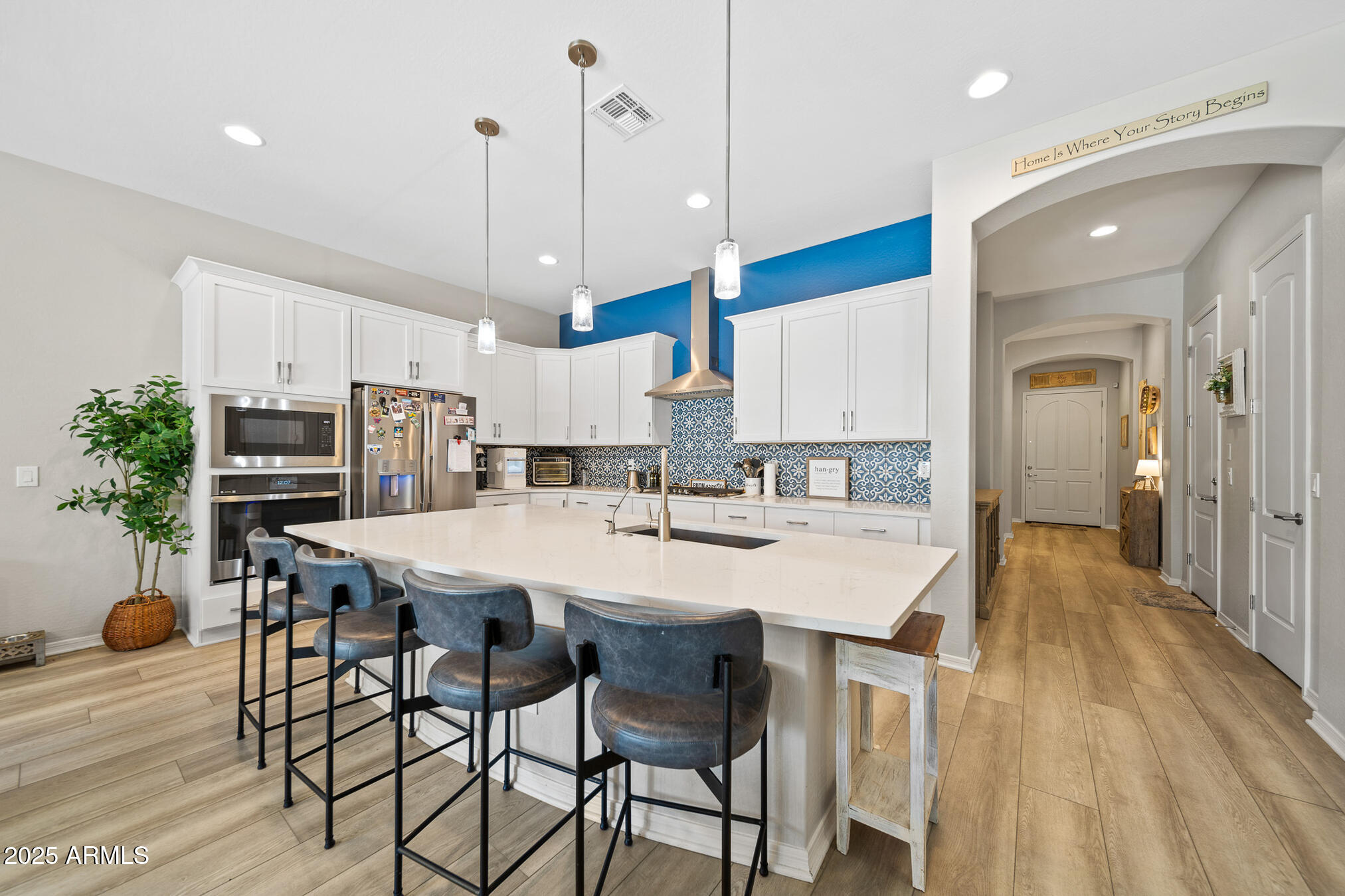 4155 East Jesse Street Gilbert, AZ 85295 - Photo 5 of 71 a large kitchen with a table and chairs