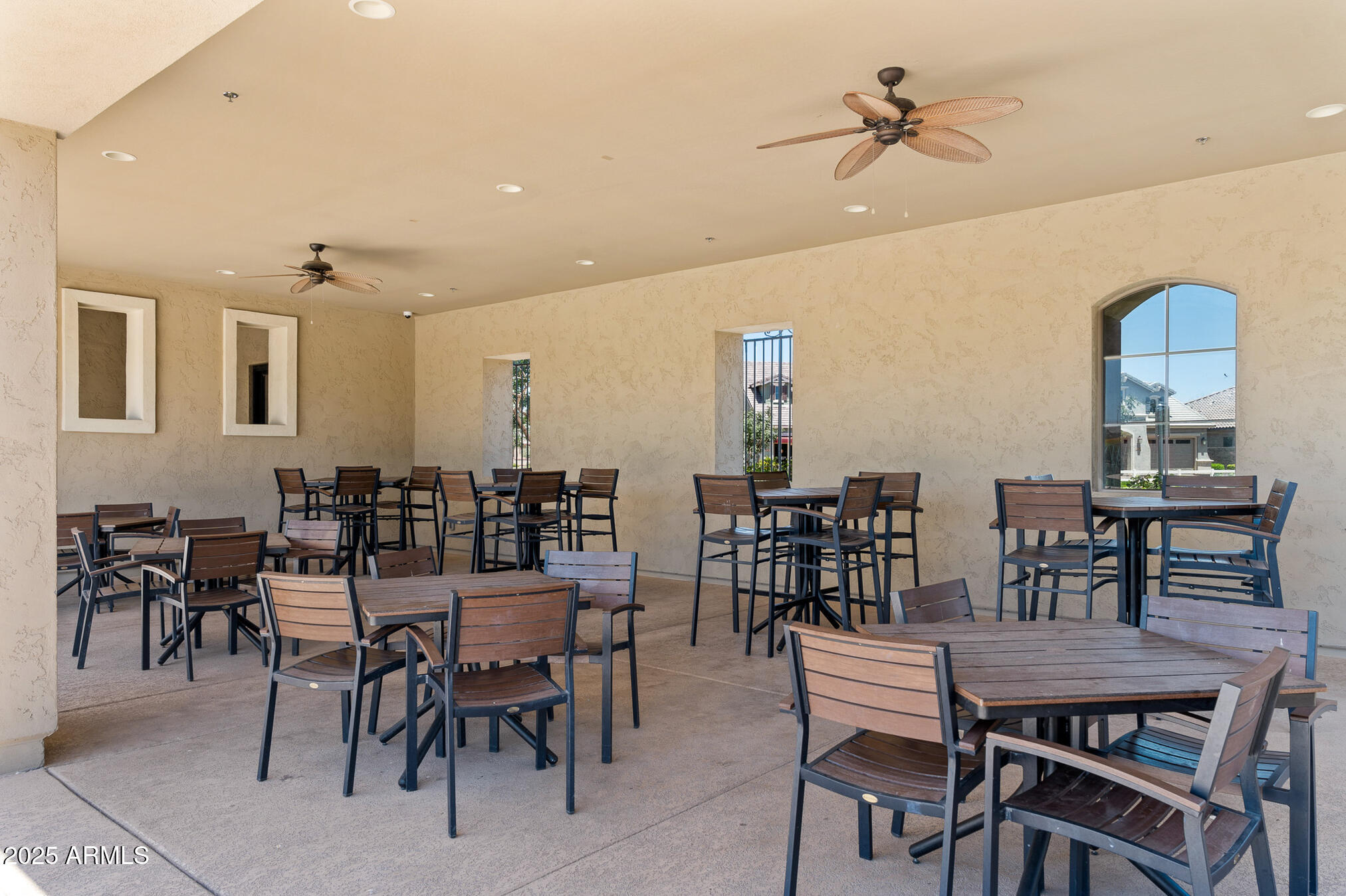 4155 East Jesse Street Gilbert, AZ 85295 - Photo 52 of 71 a view of a dining room with furniture and chandelier