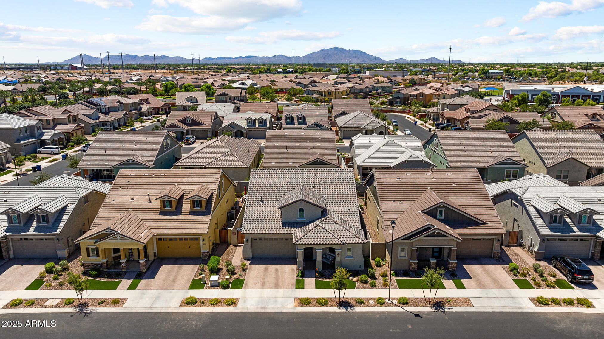 4155 East Jesse Street Gilbert, AZ 85295 - Photo 65 of 71 an aerial view of residential houses with outdoor space
