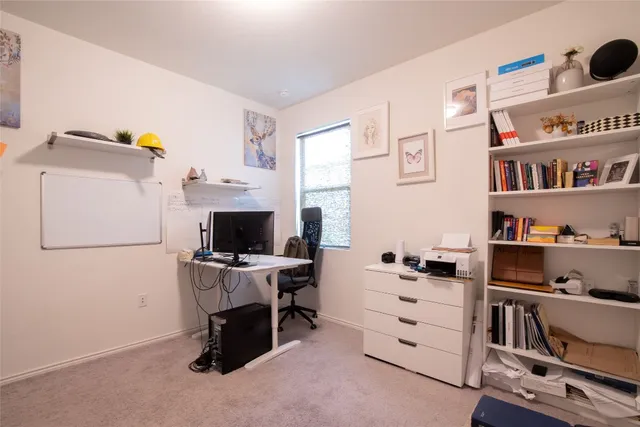 a view of workspace with cabinets