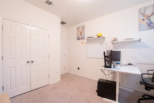 a view of workspace with cabinet