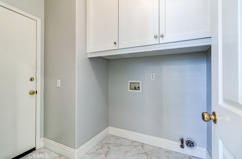 8 Zinnia Irvine, CA 92618 - Photo 26 of 63 a bathroom with a sink
