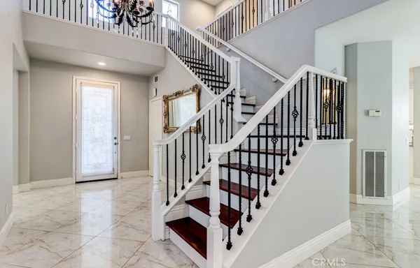 a view of a hallway with white walls